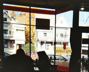 At the Madison Ave Tierra Coffee Roasters. Bike helmet and gloves are in the missing (and woefully underexposed) foreground; this part of the photo is available on request.