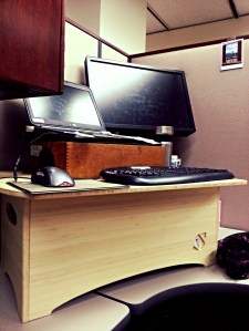 Standing desk setup, before I added a few old reports under the laptop to raise the screen.