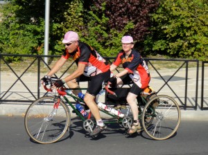 Tandem trike and matching pink caps.